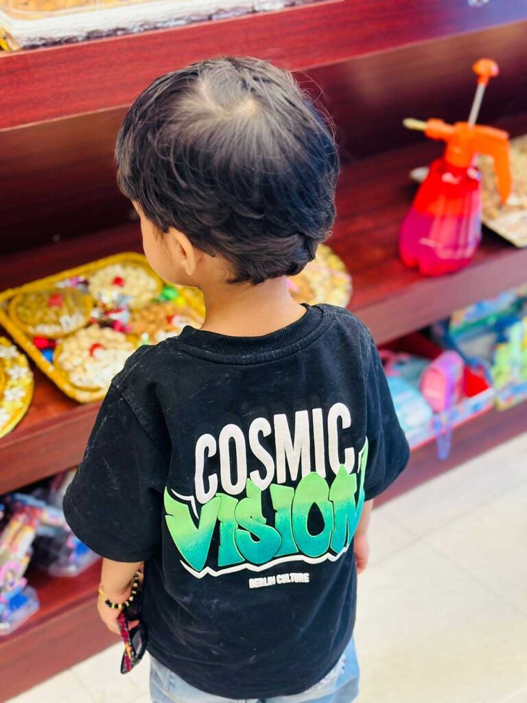 Ayden Vishnu in Berlin Culture’s unisex kids' T-shirt – vibrant and trendy.